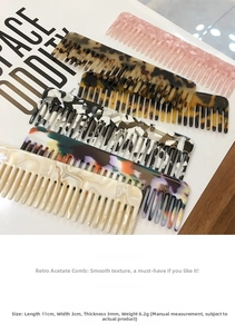 Detail view of 11cm acetate hair combs in tortoise shell and marble patterns