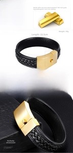 Détail d'un bracelet en cuir tressé noir pour homme avec fermoir en acier doré 18k