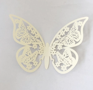 Detailed view of ivory 3D pearl paper butterfly wall sticker with hollow flower patterns