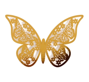 Detailed macro view of golden hollow butterfly wall sticker with intricate floral patterns
