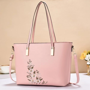 Elegante borsa tote rosa con ricamo floreale, dettagli dorati e tracolla per donna