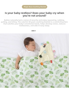 Detailed view of the 3D sensory dots and colorful ribbons on baby security blanket