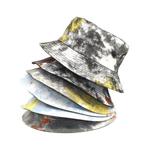 Double-sided reversible graffiti bucket hat with colorful tie-dye splash pattern