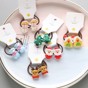 Christmas hair ties set with Santa, snowman and reindeer charms for kids' hair styling