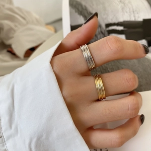 Minimalist 925 sterling silver rings with layered ribbed design in gold and silver finish