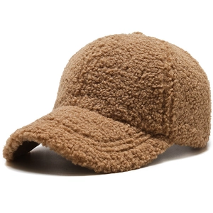 Thick brown sherpa lamb wool baseball cap with classic curved brim for winter warmth