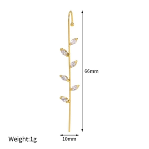 Detailed view of leaf-shaped gold earring with zircon stones, measuring 66mm by 10mm