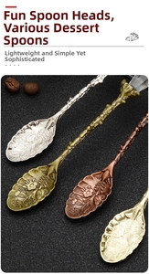 Close-up of vintage alloy dessert spoons with floral relief and leaf-shaped heads