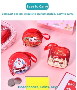 Three red Christmas tinplate wallets with Santa and snowman prints for coins and earphones