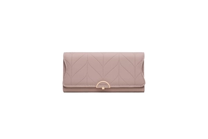 Detail of leaf-patterned quilting on pink long wallet with golden floral buckle