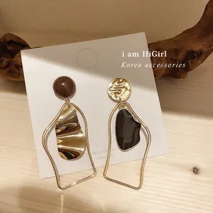 Asymmetric drop earrings with S925 silver needles in irregular gold and enamel design