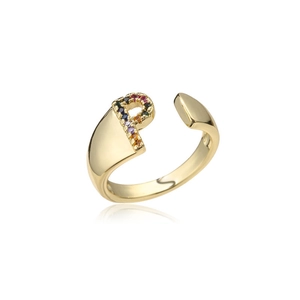 Detail shot of 18K gold letter P ring with inlaid colored gemstones on a white background