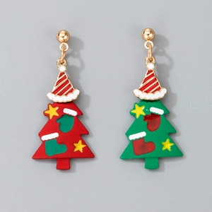 Detail of red and green Christmas tree earrings with enamel ornaments and star toppers