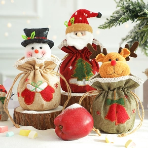 Christmas burlap gift bags with Santa, Snowman and Reindeer plush dolls and lace trim