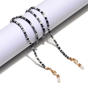 Handmade black, gray, and white heishi bead eyewear chain with gold lobster clasps