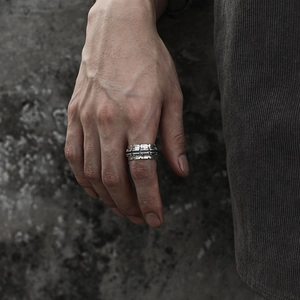 Industrial vintage silver mechanical track ring for men with embossed dot patterns