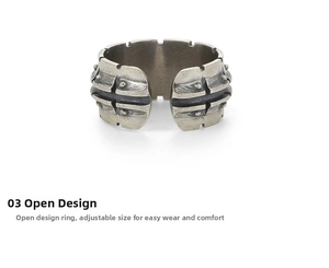 Macro detail of industrial style silver track ring showing adjustable open band design