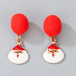 Close-up of Santa Claus stud earrings with vibrant red pompom drops on grey background