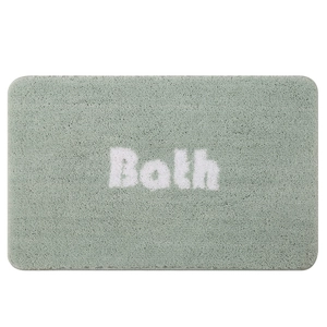 Gray-green rectangular plush bathroom mat with white Bath lettering and non-slip texture
