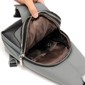 Gray oxford fabric sling bag for men with USB port and organized interior storage