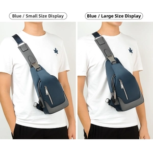 Size comparison between large and small blue Oxford fabric sling bags for men