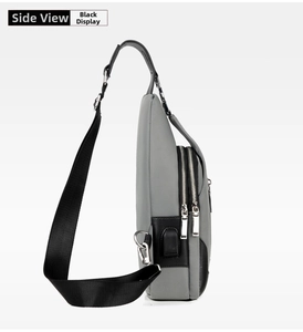 Side view of grey Oxford fabric chest bag showing layered zippers and USB charging port