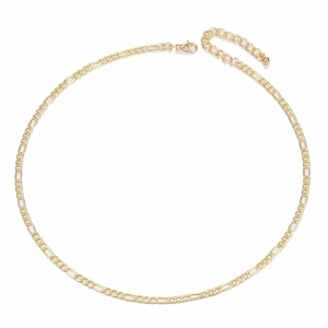 Detail of a gold Figaro chain necklace featuring long and short links with a lobster clasp