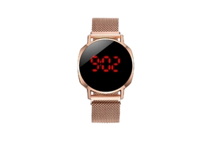 Detail of rose gold digital watch with red LED display and magnetic mesh strap