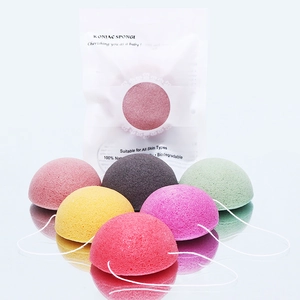 Colorful set of semi-sphere konjac facial sponges with lanyards for skin cleansing