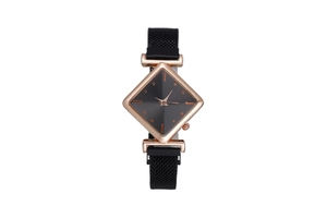 Detailed macro of rose gold rhombus watch dial and black metal mesh magnetic strap