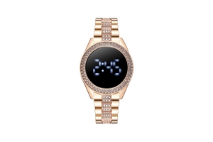 Close-up of rose gold rhinestone LED watch showing blue digital time display