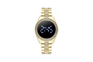 Detailed view of golden LED watch with sparkling rhinestones and blue digital display