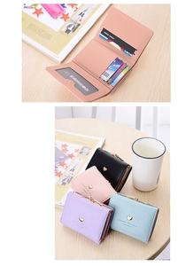 Detailed interior of women's tri-fold heart wallet featuring card slots and photo window