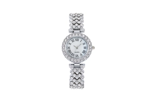 Detail of silver ladies quartz watch featuring rhinestone-set bezel and Roman numeral dial