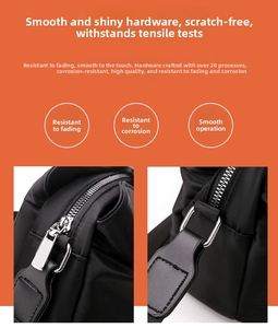 Detailed close-up of high-quality silver metal zipper on a black fabric mobile phone bag