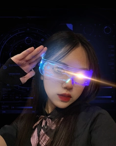 Detail view of cyber neon LED glasses with blue and purple glowing cyberpunk light effects