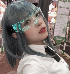 Cyberpunk LED glasses with HUD texture worn by a model in futuristic neon street night