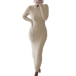 Detailed cable knit pattern on a slim-fit oatmeal long-sleeve knitted maxi dress