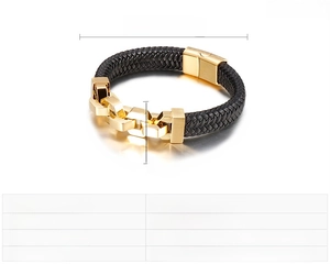 Detail view of woven black leather bracelet with gold stainless steel magnetic clasp