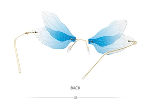 Rear view of rimless dragonfly wing sunglasses with gradient blue lenses and gold frame
