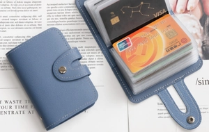 Blue lychee grain leather card holder with multiple PVC slots and silver buckle