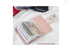 Detail of pink leather card holder with large capacity accordion slots for bank cards