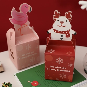 Cartoon Christmas gift boxes featuring flamingo and reindeer designs on a festive background