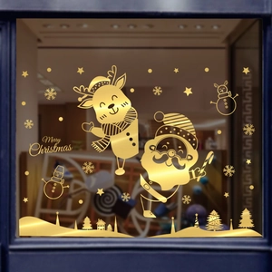 Golden Christmas window static stickers with reindeer and Santa Claus in festive scene
