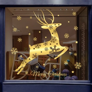 Golden Christmas reindeer window sticker with snowflakes and stars for holiday decor