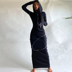 Detail view of black long sleeve hooded maxi dress with contrast decorative outer stitching
