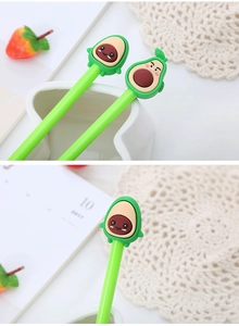 Detailed view of creative avocado cartoon pens with green barrels and silicone tops
