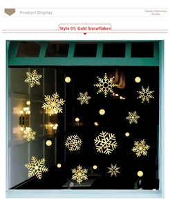 Detailed view of shiny gold snowflake window decals with brushed metallic texture stickers