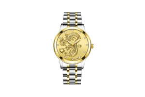 Macro shot of gold dragon relief and diamond markers on the stainless steel watch dial