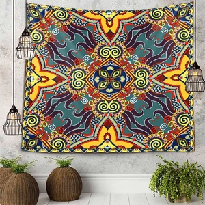 Detail of bohemian mandala tapestry featuring symmetrical ethnic patterns and vibrant colors